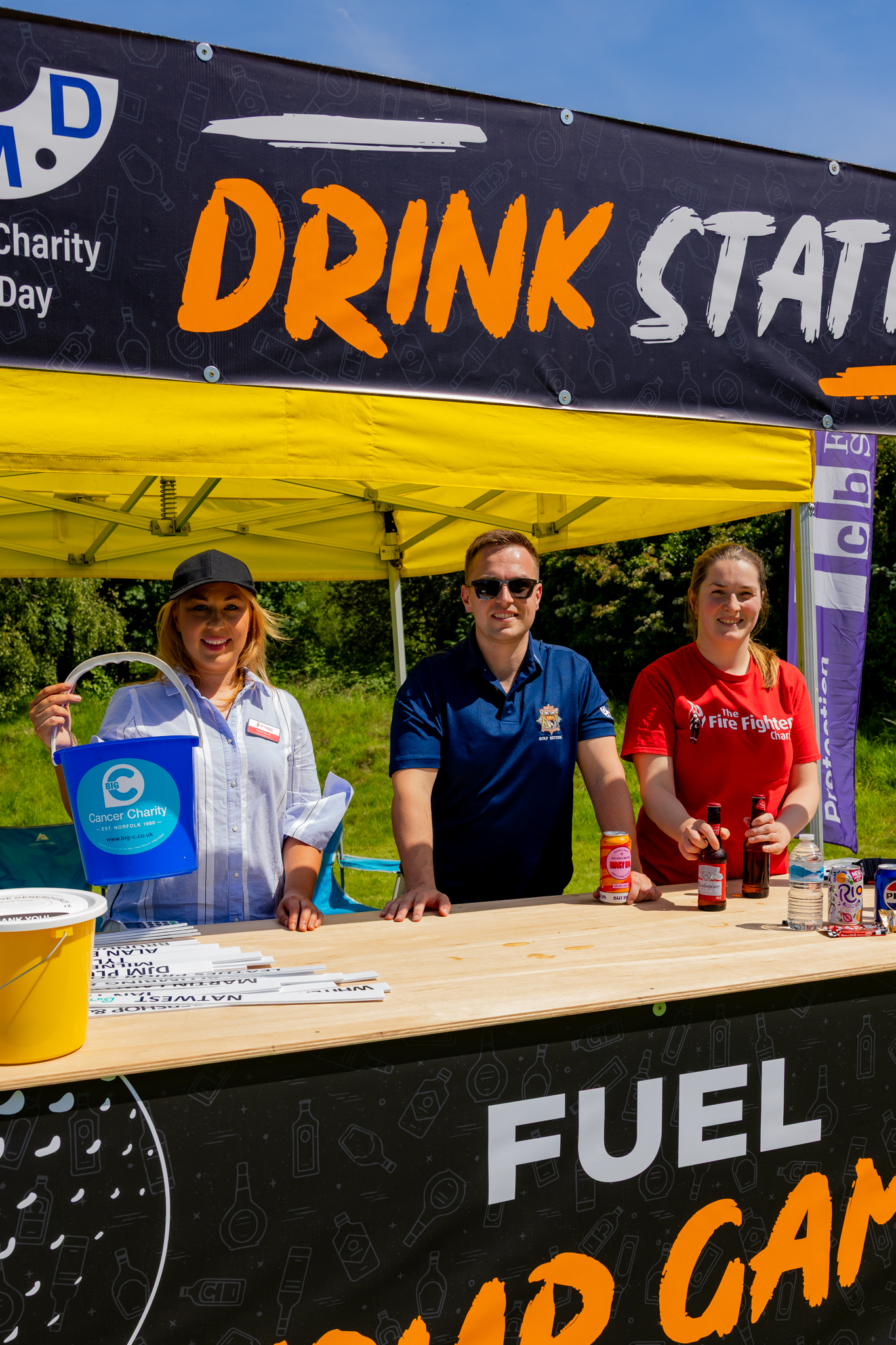 team at the drink station at the dmd golf day